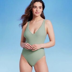 KONA SOL V-Neck High Leg One Piece Swimsuit In Sage Green. Size Med